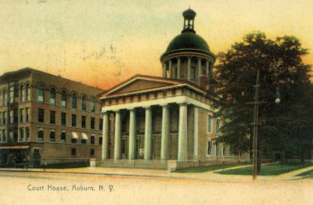 Vintage hand-colored postcard of the Cayuga County Courthouse with a green dome, Auburn, New York
